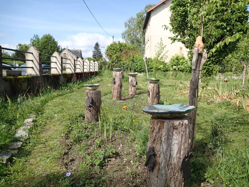Bains d'oiseaux réalisés avec les enfants