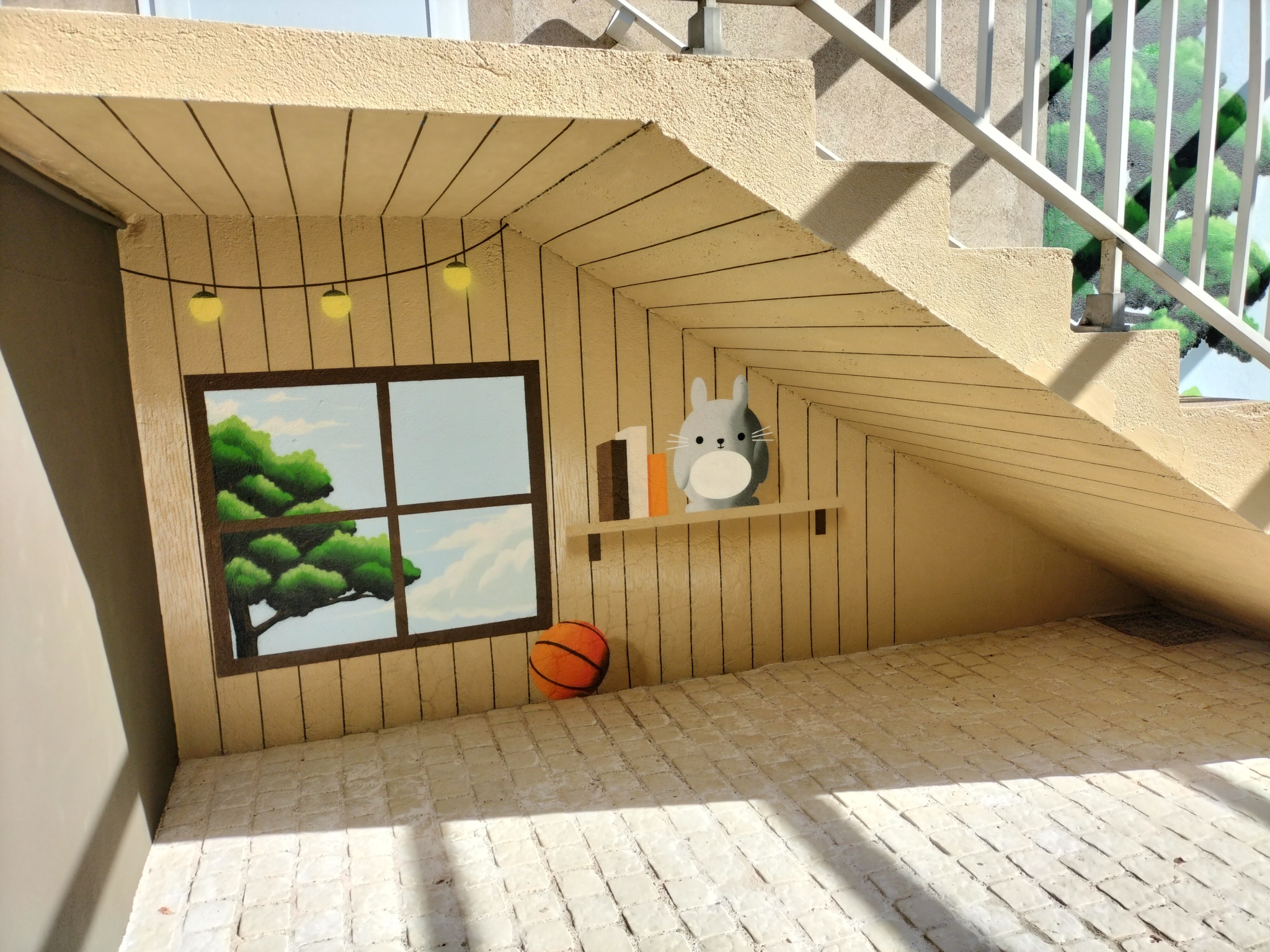 Coin cabane sous l'escalier